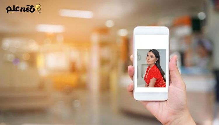 صورة بها يد تمسك هاتف عليه صورة الفنانة السورية هبة نور ضمن الحديث عن سكس الفنانة هبة نور